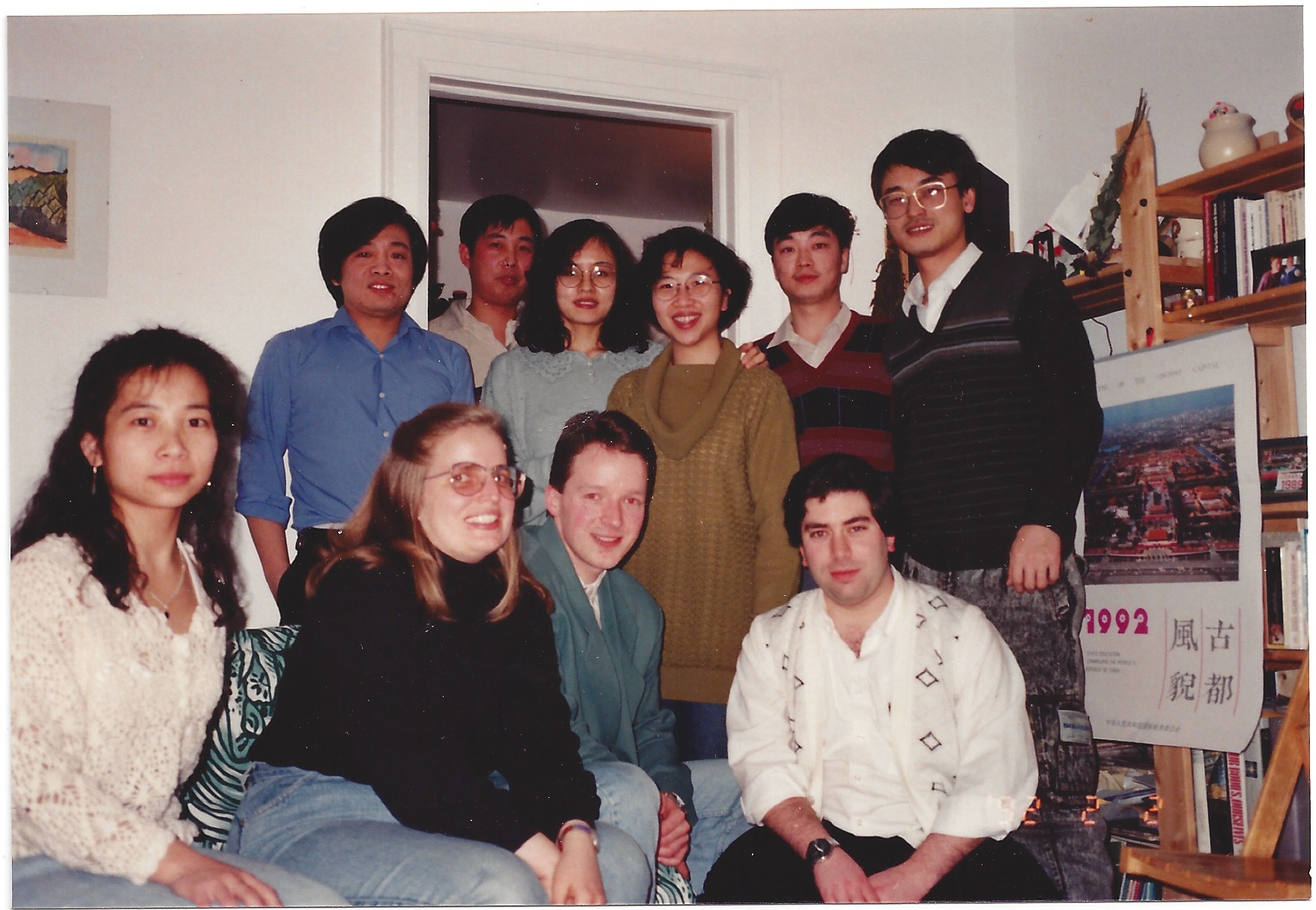 A group of people from the Math Department pose for a photo together at an informal party